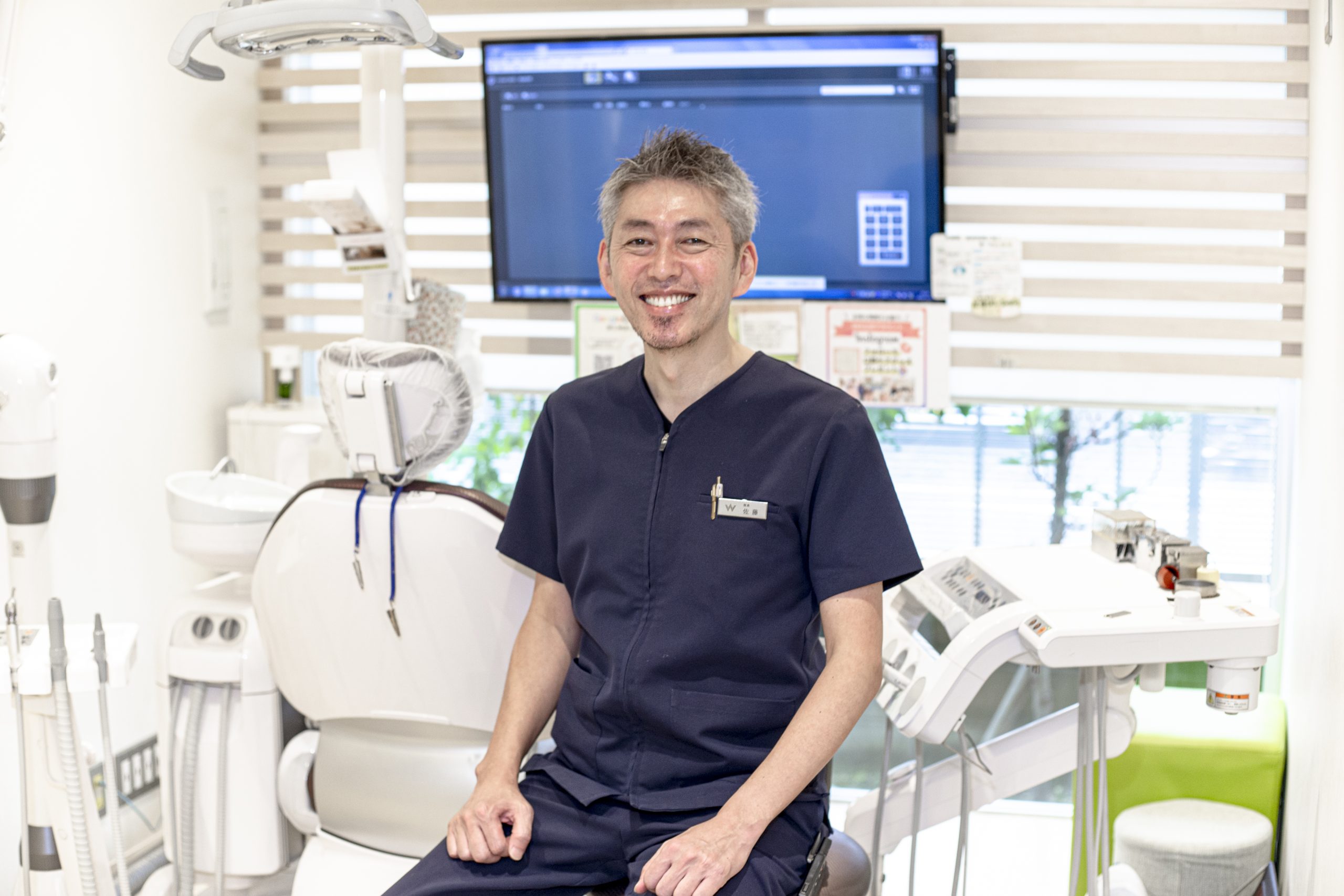 さくら歯科クリニック院長・佐藤正彰のプロフィール写真。